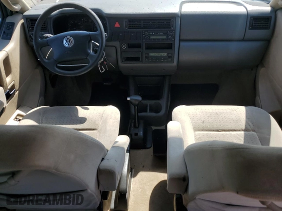 2003 Volkswagen EuroVan с VIN WV2KB47043H001319, выставлен на аукционе Copart как лот 73758024 с пробегом 88 497 миль миль и Чистый • Clean title. История ставок и продаж доступна на DreamBid. Изображение 8.