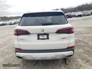 2021 BMW X5 sDrive40i with VIN 5UXCR4C02M9G19725, listed as a Copart auction lot 47860955 with 0 mi miles and Clean Title. Bid and sale history available at carsss.com. Image 6.