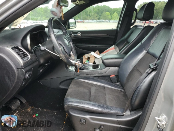 2021 Jeep Grand Cherokee Laredo E with VIN 1C4RJEAG9MC657803, listed as a Copart auction lot 55797185 with 79,357 mi miles and Salvage title. Bid and sale history available at DreamBid. Image 7.