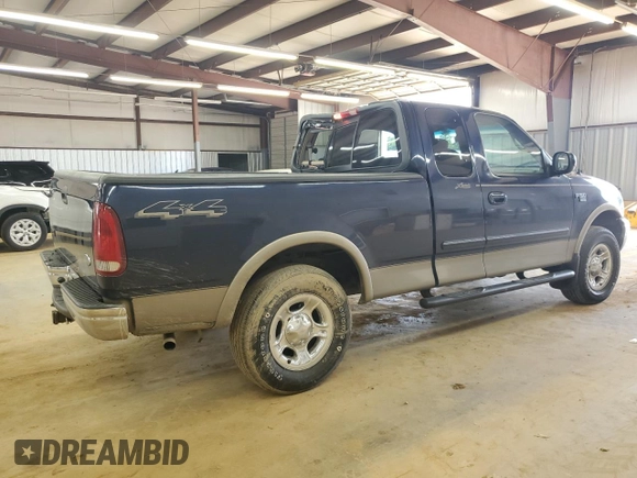 2002 Ford F-150 XL with VIN 1FTRX18L62NA69837, listed as a Copart auction lot 61581935 with 130,078 mi miles and Salvage title. Bid and sale history available at DreamBid. Image 3.