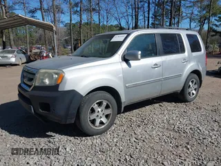 2010 Honda Pilot Touring with VIN 5FNYF4H91AB020868, listed as a IAAI auction lot 41783104 with 298,022 mi miles and . Bid and sale history available at carsss.com. Image 19.