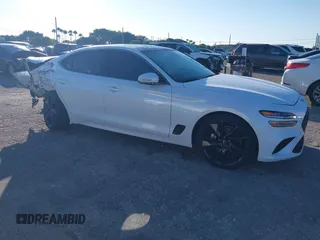 2023 Genesis G70 2.0T with VIN KMTG34TA9PU110258, listed as a IAAI auction lot 40985797 with 23,422 mi miles. Bid and sale history available at carsss.com. Image 1.