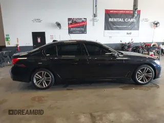2019 BMW 7 Series 750i xDrive with VIN WBA7F2C51KB239044, listed as a IAAI auction lot 42756026 with 65,028 mi miles and . Bid and sale history available at DreamBid. Image 13.