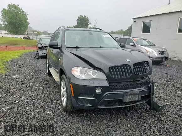 2012 BMW X5 35i with VIN 5UXZV4C57CL765053, listed as a Copart auction lot 59997275 with 157,943 mi miles and Salvage title. Bid and sale history available at DreamBid. Image 14.