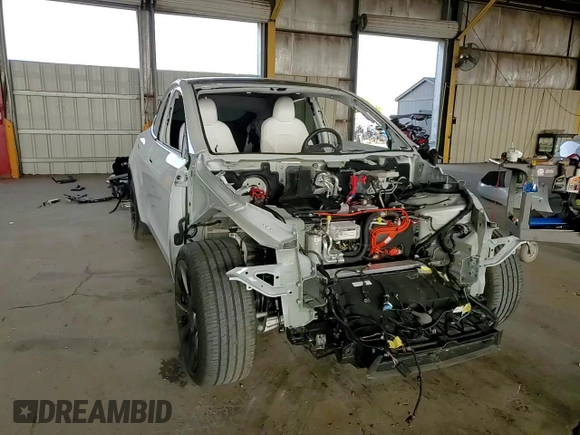 2024 Tesla Model Y Long Range z VIN 7SAYGDEE7RA217991, wystawiony jako Copart lot #50885695 z przebiegiem Nie podano mil oraz Szkoda całkowita • Salvage title. Historia ofert i sprzedaży dostępna na DreamBid. Obrazek 12.