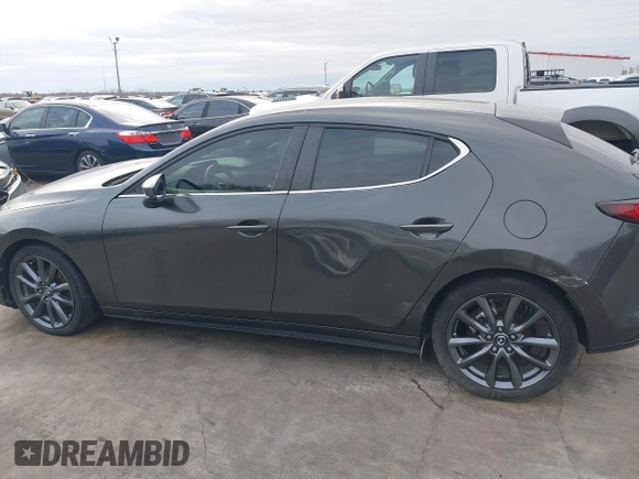 2019 Mazda 3 with VIN JM1BPAJMXK1121384, listed as a IAAI auction lot 41365150 with 38,899 mi miles and . Bid and sale history available at DreamBid. Image 14.