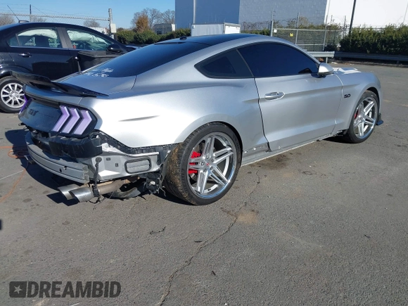 2018 Ford Mustang GT with VIN 1FA6P8CF4J5144438, listed as a IAAI auction lot 41338421 with 87,687 mi miles and . Bid and sale history available at carsss.com. Image 4.