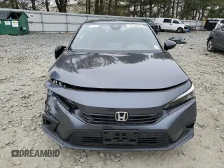 2023 Honda Civic Sport z VIN 2HGFE2F50PH556908, wystawiony jako Copart lot #52789655 z przebiegiem Nie podano mil oraz Szkoda całkowita • Salvage title. Historia ofert i sprzedaży dostępna na DreamBid. Obrazek 5.