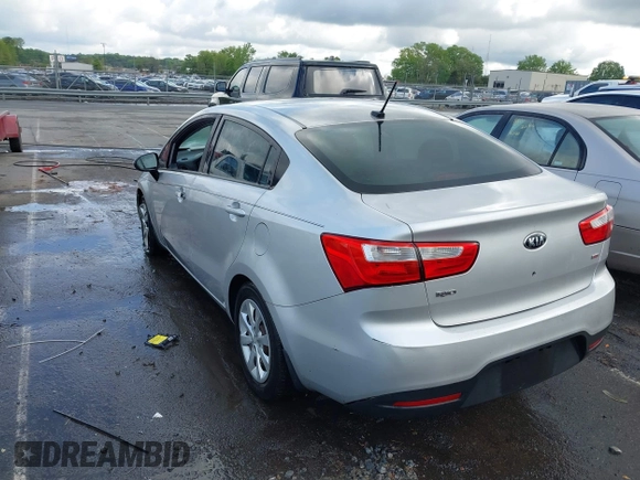 2014 Kia Rio LX with VIN KNADM4A31E6413780, listed as a IAAI auction lot 41996928 with 93,446 mi miles and . Bid and sale history available at DreamBid. Image 3.