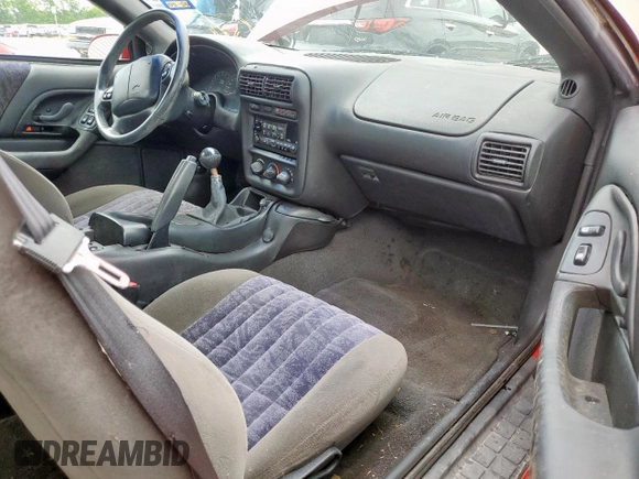 2002 Chevrolet Camaro z VIN 2G1FP22K322135404, wystawiony jako Copart lot #58767305 z przebiegiem Nie podano mil oraz Czysty tytuł • Clean title. Historia ofert i sprzedaży dostępna na DreamBid. Obrazek 11.