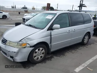2003 Honda Odyssey EX-L with VIN 5FNRL18943B030373, listed as a IAAI auction lot 41867289 with 179,718 mi miles and . Bid and sale history available at DreamBid. Image 18.
