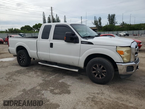 2012 Ford F-250 XL with VIN 1FT7X2A61CEC15533, listed as a Copart auction lot 57883444 with 195,030 mi miles and Salvage title. Bid and sale history available at DreamBid. Image 4.