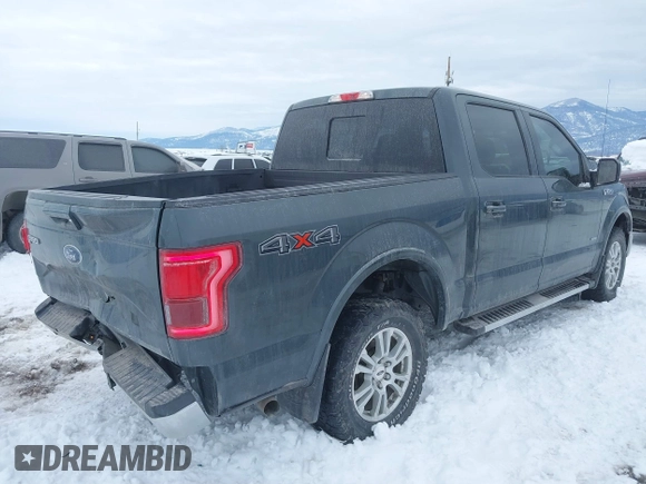 2015 Ford F-150 XLT with VIN 1FTEW1EP6FFB48630, listed as a IAAI auction lot 41597442 with 128,428 mi miles. Bid and sale history available at carsss.com. Image 4.