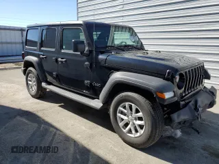 2023 Jeep Wrangler Sport with VIN 1C4HJXDNXPW701795, listed as a Copart auction lot 50451444 with 7,274 mi miles and Salvage Title. Bid and sale history available at DreamBid. Image 4.