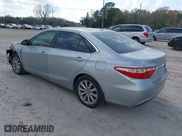 2015 Toyota Camry XLE with VIN 4T1BF1FK8FU489850, listed as a IAAI auction lot 41555007 with 182,206 mi miles and . Bid and sale history available at DreamBid. Image 3.