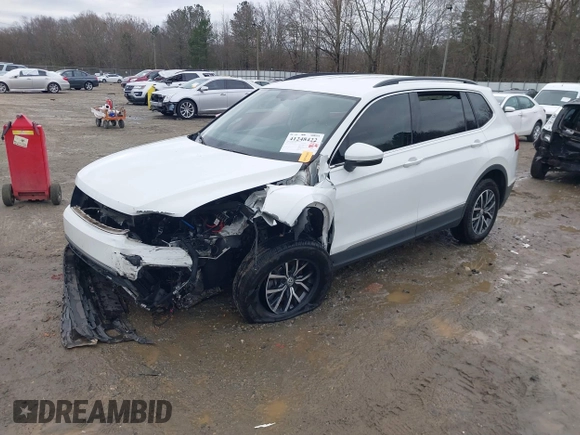 2020 Volkswagen Tiguan SE with VIN 3VV3B7AX2LM055418, listed as a IAAI auction lot 41248422 with Not Provided miles and . Bid and sale history available at DreamBid. Image 17.