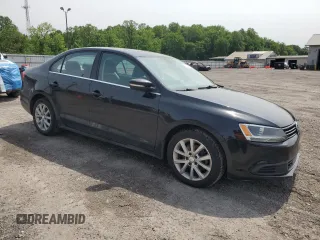 2013 Volkswagen Jetta SE with VIN 3VWDP7AJ8DM360632, listed as a Copart auction lot 57238425 with 133,972 mi miles and Salvage title. Bid and sale history available at DreamBid. Image 4.