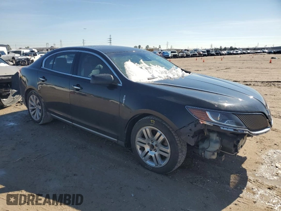 2014 Lincoln MKS z VIN 1LNHL9DK3EG606655, wystawiony jako Copart lot #42008655 z przebiegiem 100 886 mil mil oraz Szkoda całkowita • Salvage title. Historia ofert i sprzedaży dostępna na DreamBid. Obrazek 4.