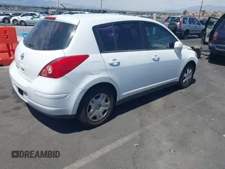 2011 Nissan Versa 1.8 S with VIN 3N1BC1CP0BL452473, listed as a IAAI auction lot 42171311 with 167,018 mi miles. Bid and sale history available at carsss.com. Image 4.