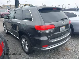 2014 Jeep Grand Cherokee Summit with VIN 1C4RJFJG8EC434899, listed as a IAAI auction lot 42399912 with 186,840 mi miles and . Bid and sale history available at DreamBid. Image 3.