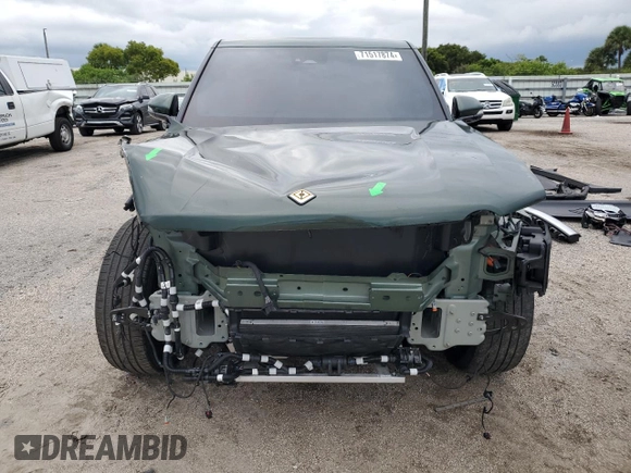 2023 Rivian R1T Adventure z VIN 7FCTGAAA8PN001040, wystawiony jako Copart lot #71517874 z przebiegiem 19 789 mil mil oraz Szkoda całkowita • Salvage title. Historia ofert i sprzedaży dostępna na DreamBid. Obrazek 5.
