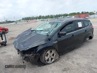 2015 Ford Escape SE with VIN 1FMCU0G98FUA80408, listed as a IAAI auction lot 41955818 with 129,908 mi miles. Bid and sale history available at carsss.com. Image 2.
