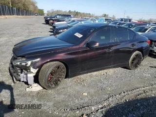 2015 Infiniti Q50 Premium z VIN JN1BV7AR8FM414969, wystawiony jako Copart lot #50594665 z przebiegiem 87 250 mil mil oraz Szkody całkowita. Historia ofert i sprzedaży dostępna na DreamBid. Obrazek 1.