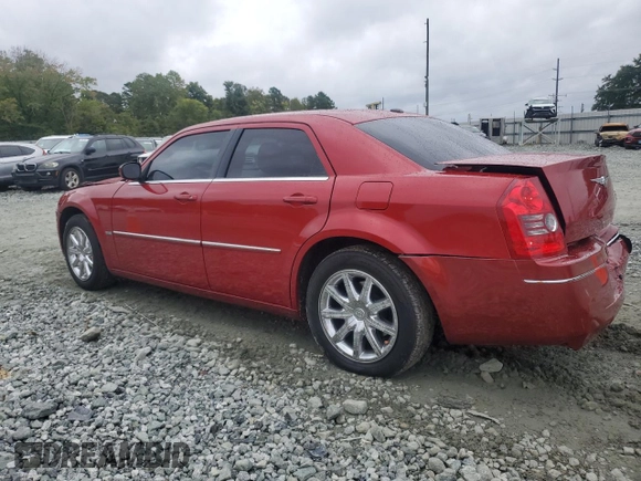 2009 Chrysler 300 Touring with VIN 2C3KA53V99H617274, listed as a Copart auction lot 71791144 with 123,045 mi miles and Salvage Title. Bid and sale history available at carsss.com. Image 2.