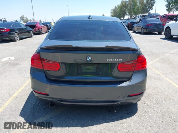2014 BMW 3 Series 328d with VIN WBA3D3C51EK155031, listed as a IAAI auction lot 42149784 with 204,521 mi miles and . Bid and sale history available at carsss.com. Image 16.