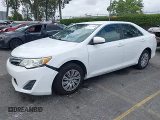 2014 Toyota Camry L with VIN 4T1BF1FK4EU403013, listed as a IAAI auction lot 42115089 with 221,686 mi miles and . Bid and sale history available at DreamBid. Image 2.