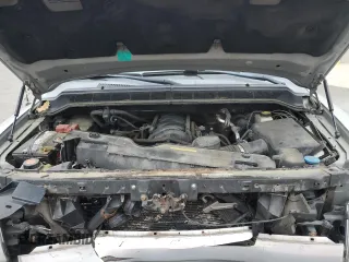 2011 Nissan Titan S z VIN 1N6AA0CJ7BN322207, wystawiony jako Copart lot #77558164 z przebiegiem 177 105 mil mil oraz Szkoda całkowita • Salvage title. Historia ofert i sprzedaży dostępna na DreamBid. Obrazek 13.