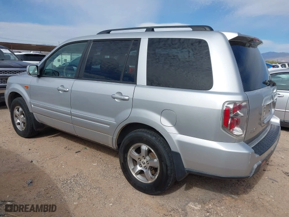 2006 Honda Pilot EX with VIN 2HKYF184X6H519132, listed as a IAAI auction lot 42030952 with 256,094 mi miles. Bid and sale history available at carsss.com. Image 3.