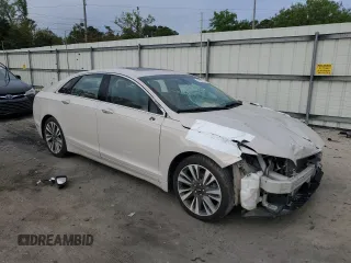 2019 Lincoln MKZ Hybrid Reserve II with VIN 3LN6L5MU9KR633669, listed as a Copart auction lot 51943355 with 98,581 mi miles and Salvage title. Bid and sale history available at DreamBid. Image 4.