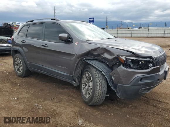 2020 Jeep Cherokee Trailhawk with VIN 1C4PJMBXXLD500953, listed as a Copart auction lot 58761405 with 68,457 mi miles and Salvage title. Bid and sale history available at DreamBid. Image 4.