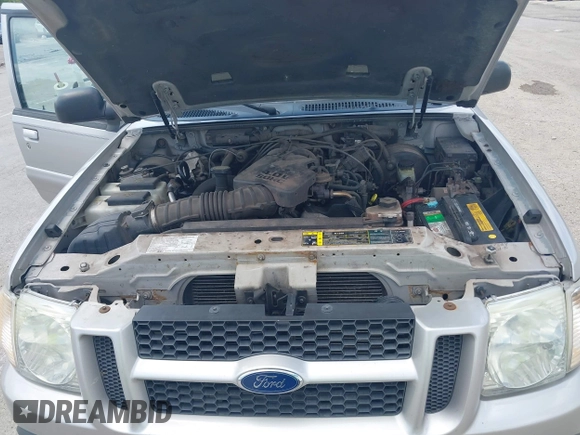 2005 Ford Explorer Sport Trac XLS z VIN 1FMZU77K15UB67801, wystawiony jako IAAI lot #42822163 z przebiegiem 179 102 mil mil oraz . Historia ofert i sprzedaży dostępna na DreamBid. Obrazek 10.