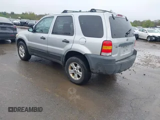 2005 Ford Escape XLT with VIN 1FMCU93115KC10947, listed as a IAAI auction lot 42215066 with 128,475 mi miles and . Bid and sale history available at DreamBid. Image 3.