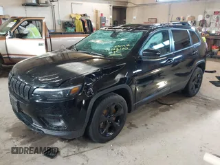 2019 Jeep Cherokee Latitude Plus with VIN 1C4PJMLX7KD283570, listed as a IAAI auction lot 41922700 with 106,829 mi miles and . Bid and sale history available at DreamBid. Image 2.