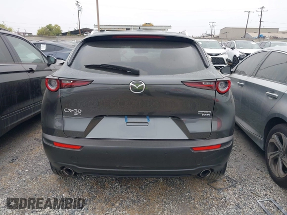 2024 Mazda CX-30 Premium Plus with VIN 3MVDMBEY1RM720111, listed as a IAAI auction lot 42730412 with 3,988 mi miles and . Bid and sale history available at DreamBid. Image 17.