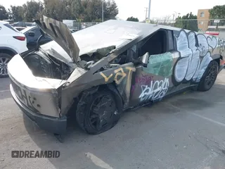 2024 Tesla Cybertruck z VIN 7G2CEHED9RA050686, wystawiony jako IAAI lot #41399354 z przebiegiem Nie podano mil oraz . Historia ofert i sprzedaży dostępna na DreamBid. Obrazek 2.