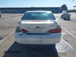 2004 Toyota Avalon XL z VIN 4T1BF28B54U362005, wystawiony jako IAAI lot #42174414 z przebiegiem 378 173 mil mil oraz . Historia ofert i sprzedaży dostępna na DreamBid. Obrazek 16.