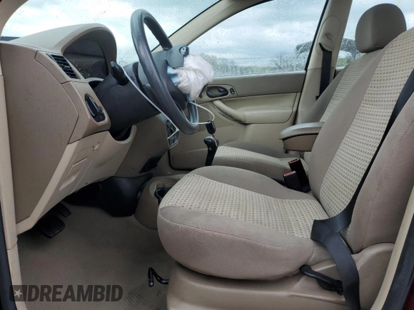 2007 Ford Focus S with VIN 1FAFP34NX7W105087, listed as a Copart auction lot 51749995 with 49,644 mi miles and Salvage Title. Bid and sale history available at carsss.com. Image 7.