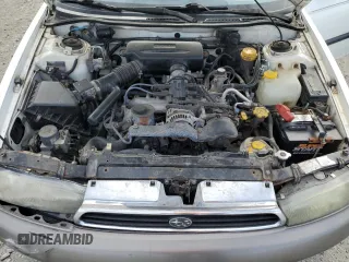 1997 Subaru Legacy L with VIN 4S3BK4359V7309059, listed as a Copart auction lot 59600835 with 136,620 mi miles and Salvage title. Bid and sale history available at DreamBid. Image 11.