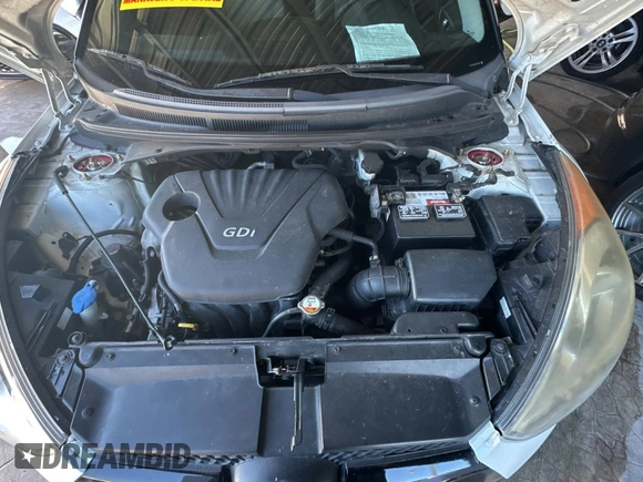 2012 Hyundai Veloster w/Red Int with VIN KMHTC6AD6CU036826, listed as a Copart auction lot 82190224 with 169,497 mi miles and Clean title. Bid and sale history available at DreamBid. Image 7.