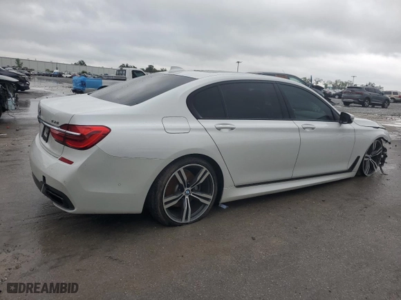 2017 BMW 7 Series 750i with VIN WBA7F0C34HGM21478, listed as a Copart auction lot 48116435 with 76,617 mi miles and Salvage Title. Bid and sale history available at carsss.com. Image 3.
