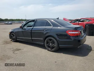 2013 Mercedes-Benz E 550 Sport with VIN WDDHF9BB8DA759750, listed as a Copart auction lot 59177825 with 63,620 mi miles and Salvage title. Bid and sale history available at DreamBid. Image 2.