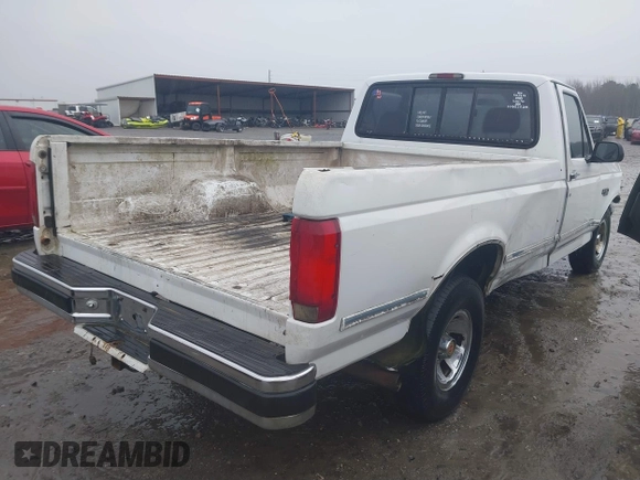 1994 Ford F-150 with VIN 1FTEF15N0RNA67826, listed as a IAAI auction lot 41547971 with 233,713 mi miles. Bid and sale history available at carsss.com. Image 4.