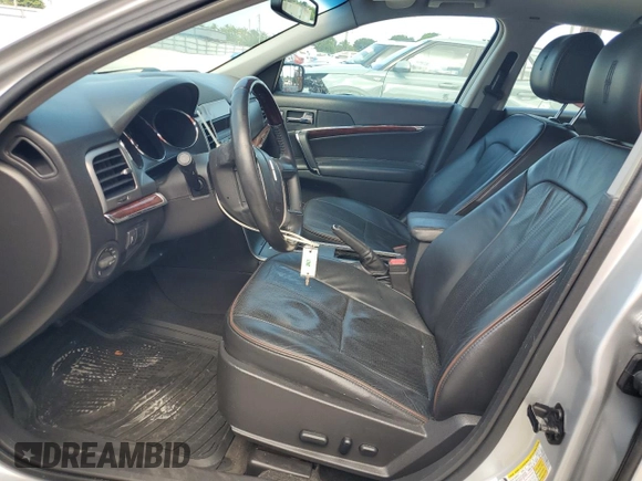 2012 Lincoln MKZ z VIN 3LNHL2GC4CR800578, wystawiony jako Copart lot #58409215 z przebiegiem 49 423 mil mil oraz Szkoda całkowita • Salvage title. Historia ofert i sprzedaży dostępna na DreamBid. Obrazek 7.