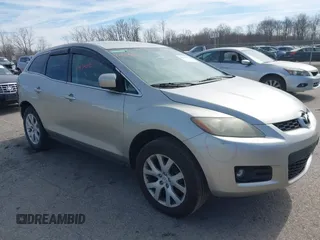 2009 Mazda CX-7 Grand Touring with VIN JM3ER29L890235402, listed as a IAAI auction lot 41834012 with 117,179 mi miles. Bid and sale history available at carsss.com. Image 1.