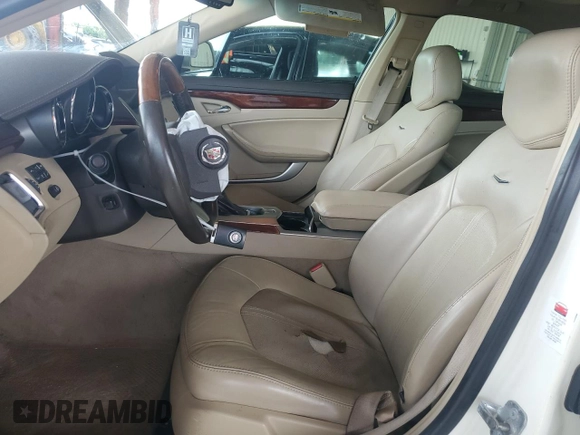2009 Cadillac CTS AWD w/1SB with VIN 1G6DT57V990151233, listed as a Copart auction lot 71209784 with 96,260 mi miles and Non Repairable. Bid and sale history available at carsss.com. Image 7.