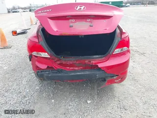 2015 Hyundai Accent GLS with VIN KMHCT4AE6FU851075, listed as a IAAI auction lot 41868391 with 90,523 mi miles. Bid and sale history available at carsss.com. Image 6.